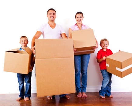 Organized storage units with packed boxes and furniture